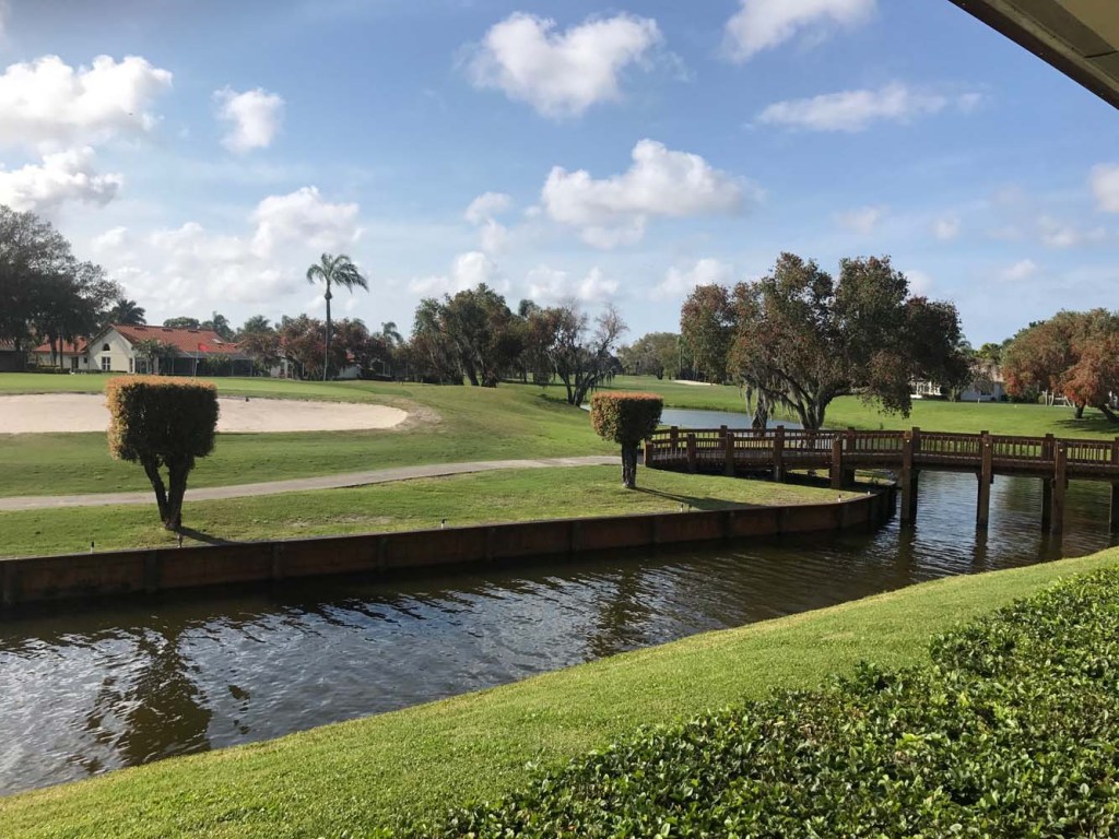View of pond on golf course